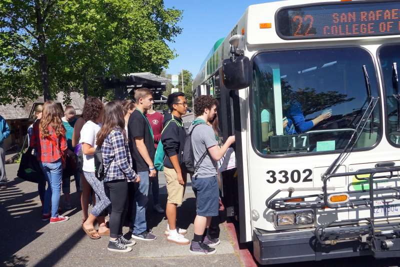 Photo of a group of students boarding a bus, ready to start the Amazing Transit Race